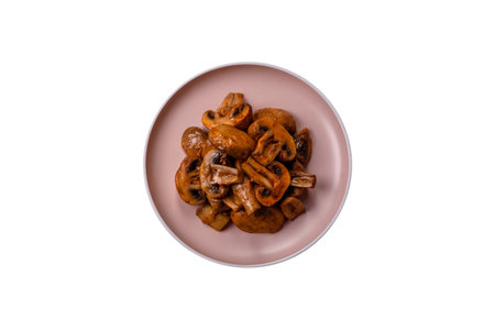 Food, baked mushrooms champignon slices with sauce and spices. Background of grilled mushroomsの写真素材