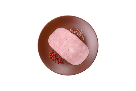 Sliced ham, meat or pork sausage for sandwiches. Cooked smoked prosciutto, ham as an ingredient for your dishesの写真素材