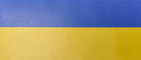 Ukrainian flag of blue and yellow colors as a symbol of independence, freedom and peace. Ukrainian flag as a concept for your designの写真素材
