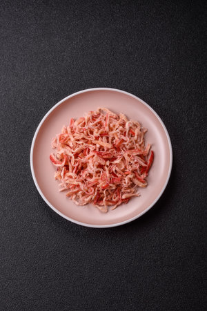 Food, dried squid in shavings or chopped as snacks or jerky. Snack dried squid for beer, background for your designの写真素材