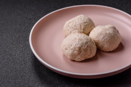 Chicken meatballs, cutlets steamed with salt and spices, a healthy meal. Steamed chicken meatball on a ceramic plateの写真素材