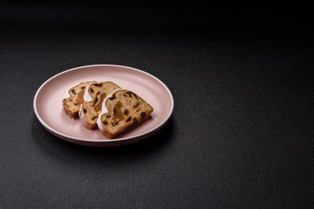 Christmas stollen, a German sweet cake with marzipan fruit and candied fruit. Winter Christmas...