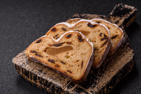 Christmas stollen, a German sweet cake with marzipan fruit and candied fruit. Winter Christmas...