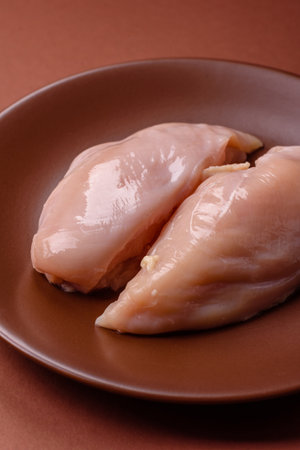 Meat, raw chicken fillets, poultry breast, skinless and boneless food. Raw chicken fillet as an ingredient for food preparationの写真素材