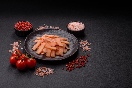 Food, dried squid in shavings or chopped as snacks or jerky. Snack dried squid for beer, background...