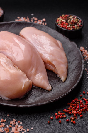 Meat, raw chicken fillets, poultry breast, skinless and boneless food. Raw chicken fillet as an ingredient for food preparationの写真素材