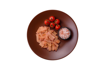 Food, dried squid in shavings or chopped as snacks or jerky. Snack dried squid for beer, background for your designの写真素材