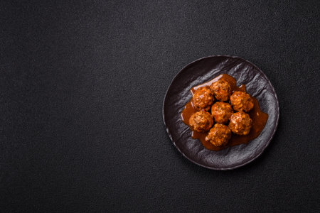 Meat, meatballs in tomato sauce, Italian food, beef or pork with salt and spices. Meatballs with...