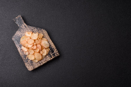 Food, dried squid in shavings or chopped as snacks or jerky. Snack dried squid, background for your designの写真素材