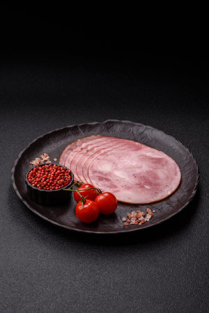 Sliced ham, meat, pork or turkey sausage for sandwiches. Ham slices, food, background for your designの写真素材