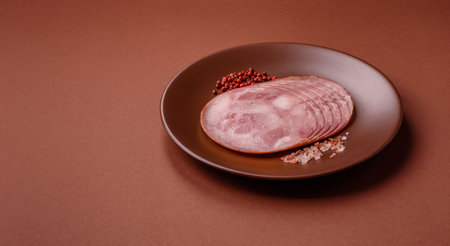 Sliced ham, meat, pork or turkey sausage for sandwiches. Ham slices, food, background for your designの写真素材