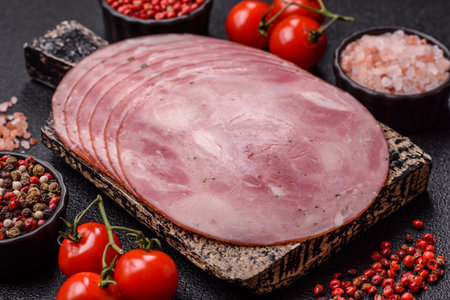 Sliced ham, meat, pork or turkey sausage for sandwiches. Ham slices, food, background for your designの写真素材