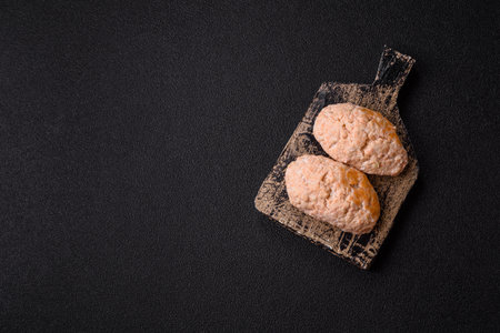 Steamed fish or chicken cutlets or meatballs with salt and spices. Fish cutlets made of chopped salmonの写真素材