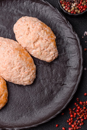 Steamed fish or chicken cutlets or meatballs with salt and spices. Fish cutlets made of chopped salmonの写真素材