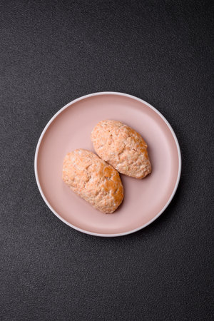 Steamed fish or chicken cutlets or meatballs with salt and spices. Fish cutlets made of chopped...