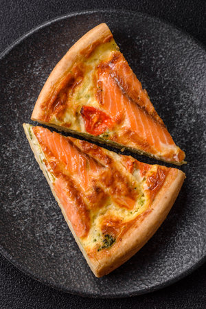 Quiche, salmon pie, broccoli, cheese. Quiche tart with fish and vegetables, cheese, salt and spices, healthy foodの写真素材