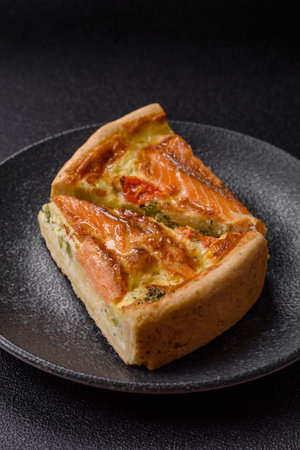 Quiche, salmon pie, broccoli, cheese. Quiche tart with fish and vegetables, cheese, salt and spices, healthy foodの写真素材