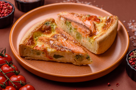 Quiche, salmon pie, broccoli, cheese. Quiche tart with fish and vegetables, cheese, salt and spices, healthy foodの写真素材