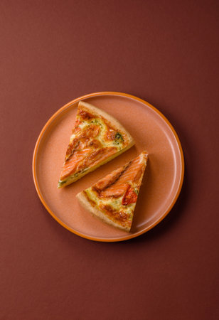 Quiche, salmon pie, broccoli, cheese. Quiche tart with fish and vegetables, cheese, salt and spices, healthy foodの写真素材