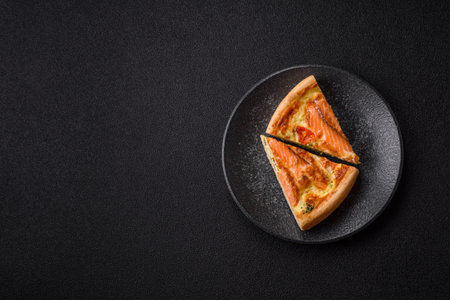 Quiche, salmon pie, broccoli, cheese. Quiche tart with fish and vegetables, cheese, salt and spices, healthy foodの写真素材