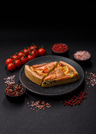 Quiche, salmon pie, broccoli, cheese. Quiche tart with fish and vegetables, cheese, salt and spices, healthy foodの写真素材