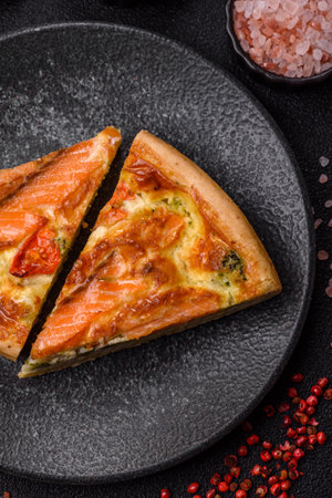 Quiche, salmon pie, broccoli, cheese. Quiche tart with fish and vegetables, cheese, salt and spices, healthy foodの写真素材