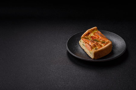 Quiche, salmon pie, broccoli, cheese. Quiche tart with fish and vegetables, cheese, salt and spices, healthy foodの写真素材