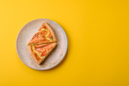 Quiche, salmon pie, broccoli, cheese. Quiche tart with fish and vegetables, cheese, salt and spices, healthy foodの写真素材