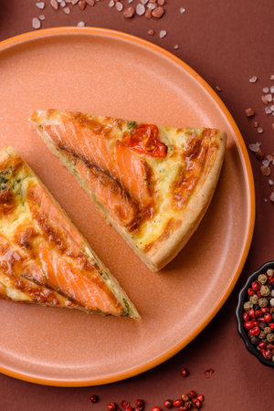 Quiche, salmon pie, broccoli, cheese. Quiche tart with fish and vegetables, cheese, salt and spices, healthy foodの写真素材