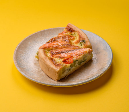 Quiche, salmon pie, broccoli, cheese. Quiche tart with fish and vegetables, cheese, salt and spices, healthy foodの写真素材