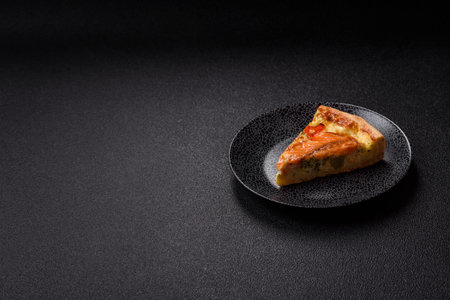 Quiche, salmon pie, broccoli, cheese. Quiche tart with fish and vegetables, cheese, salt and spices, healthy foodの写真素材
