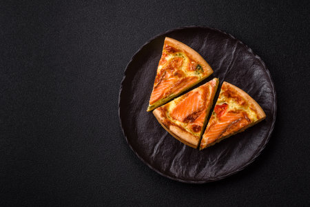 Quiche, salmon pie, broccoli, cheese. Quiche tart with fish and vegetables, cheese, salt and spices, healthy foodの写真素材