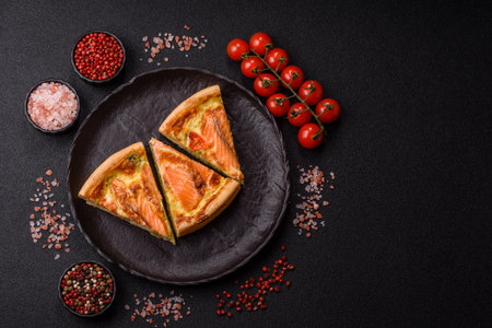 Quiche, salmon pie, broccoli, cheese. Quiche tart with fish and vegetables, cheese, salt and spices, healthy foodの写真素材