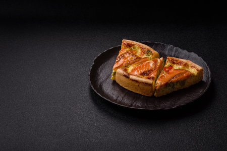 Quiche, salmon pie, broccoli, cheese. Quiche tart with fish and vegetables, cheese, salt and spices, healthy foodの写真素材