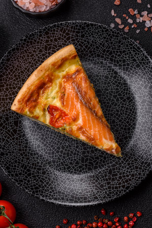 Quiche, salmon pie, broccoli, cheese. Quiche tart with fish and vegetables, cheese, salt and spices, healthy foodの写真素材