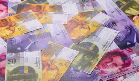 Swiss money, peso, paper banknotes, cash. Switzerland money for doing business, travelingの写真素材