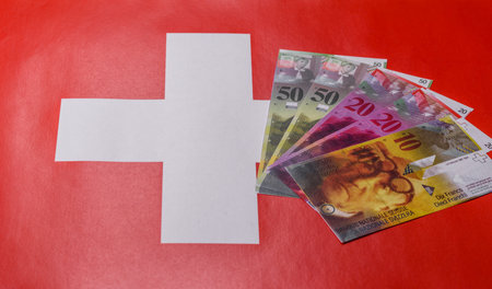 Swiss money, peso, paper banknotes, cash. Switzerland money for doing business, travelingの写真素材