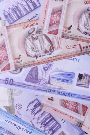 UAE money, dirham, paper banknotes, cash. Emirates money for doing business, travelling