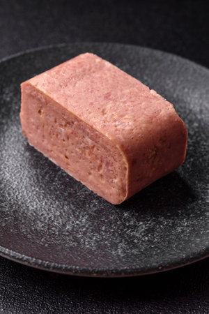 Food, meat, ham sliced in slices for the festive table. Ham with spices, fresh healthy foodの写真素材