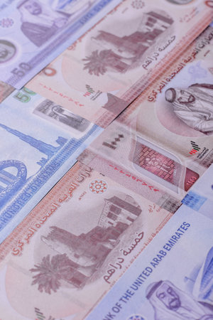 UAE money, dirham, paper banknotes, cash. Emirates money for doing business, travelling