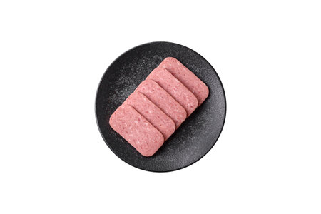 Food, meat, ham sliced in slices for the festive table. Ham with spices, fresh healthy food