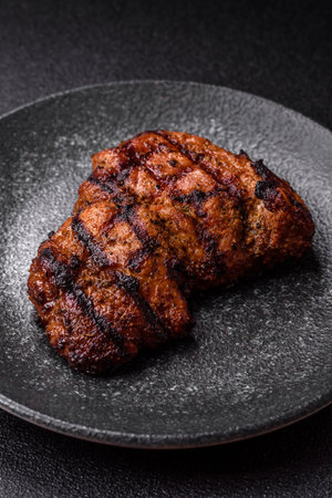 Meat, juicy beef steak grilled cooked to perfection for lunch. Barbecue steak, meat for a hearty mealの写真素材
