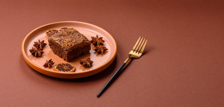 Chocolate brownie cake, food, sweet dessert with nuts rectangular shape. A slice of sweet chocolate brownie for the dinner tableの写真素材
