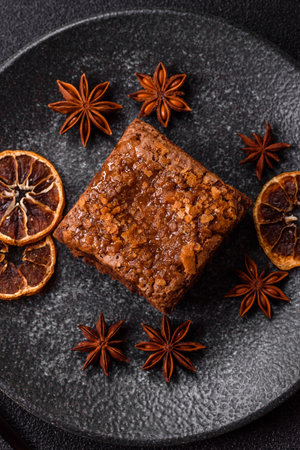Chocolate brownie cake, food, sweet dessert with nuts rectangular shape. A slice of sweet chocolate brownie for the dinner tableの写真素材