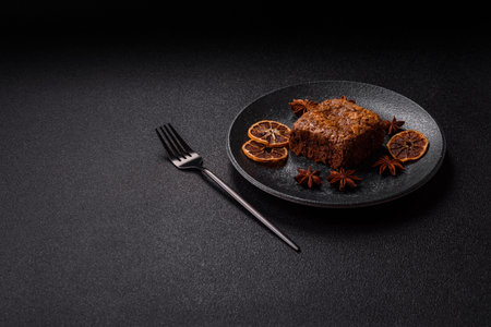Chocolate brownie cake, food, sweet dessert with nuts rectangular shape. A slice of sweet chocolate brownie for the dinner tableの写真素材