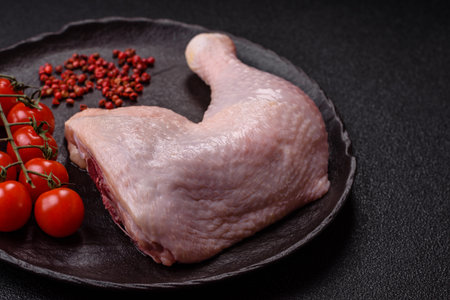 Chicken raw leg or quarter, fresh meat for cooking on barbecue. Chicken quarter for baking at homeの写真素材