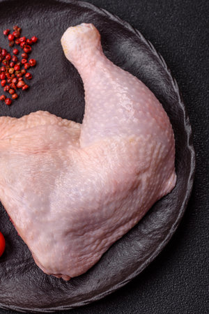 Chicken raw leg or quarter, fresh meat for cooking on barbecue. Chicken quarter for baking at homeの写真素材