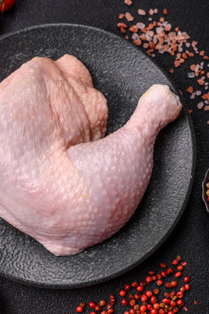 Chicken raw leg or quarter, fresh meat for cooking on barbecue. Chicken quarter for baking at homeの写真素材