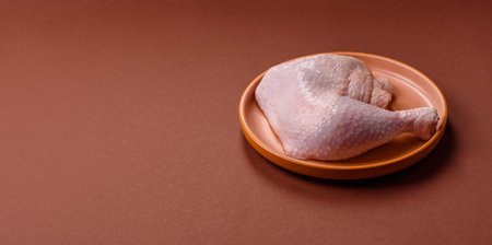 Chicken raw leg or quarter, fresh meat for cooking on barbecue. Chicken quarter for baking at homeの写真素材