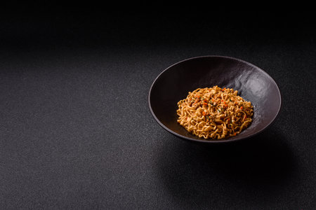 Instant noodles or ramen, Asian food, pasta with vegetables and spices. Noodles, takeaway food, instant mealの写真素材